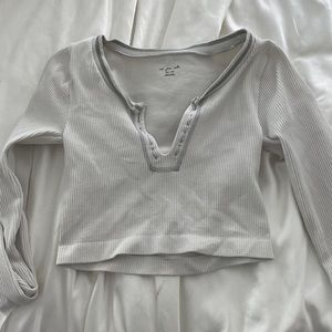 white and gray cropped long sleeve urban top